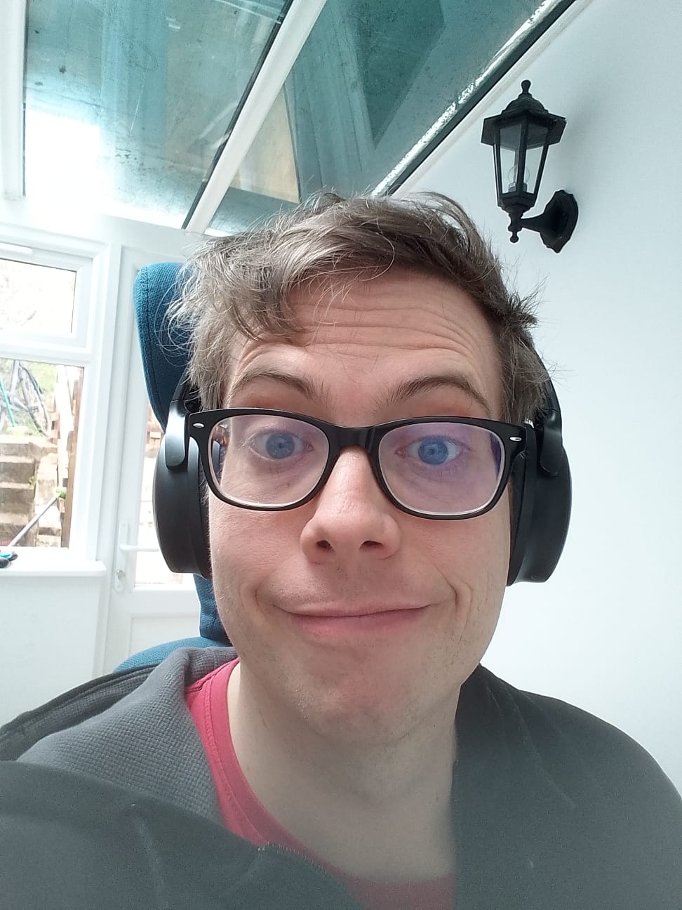 An image of a tired autistic gay who hasn't slept all too well but has the best of intentions.